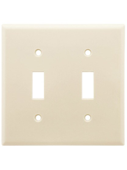 Leviton Double Toggle Cover Plate in Light Almond.
